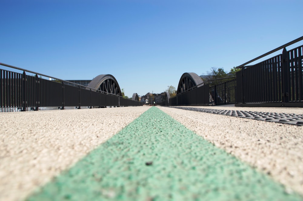 green and white concrete building under blue sky during daytime