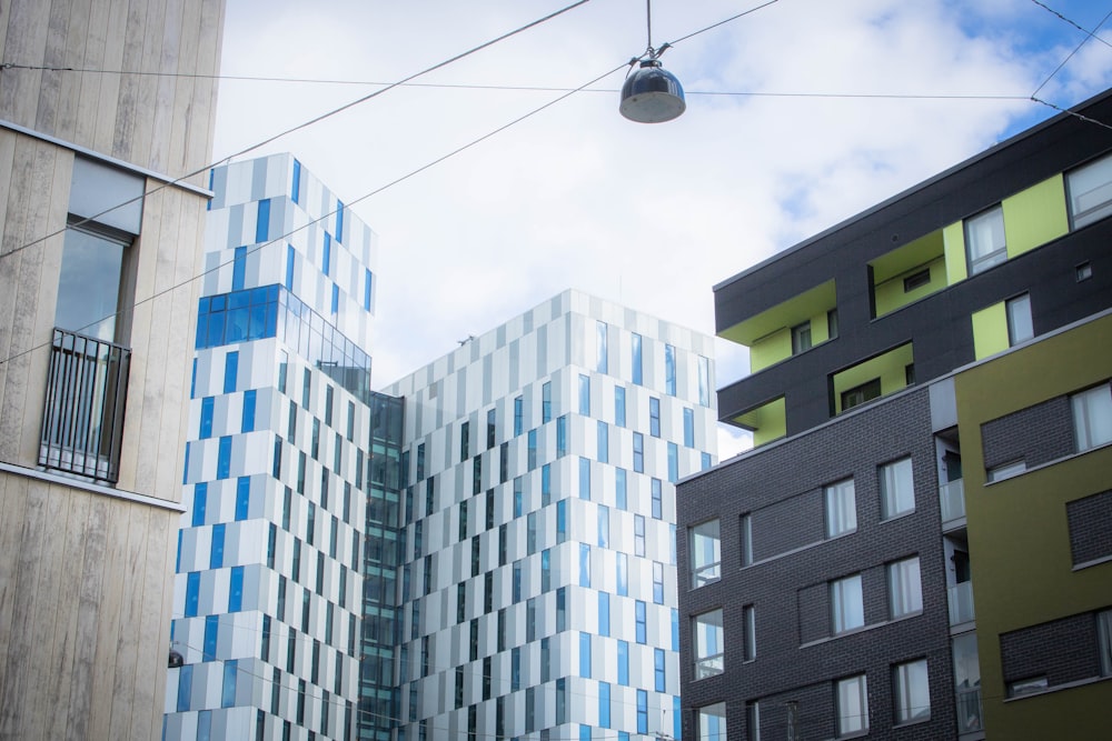 white and blue concrete building under blue sky during daytime