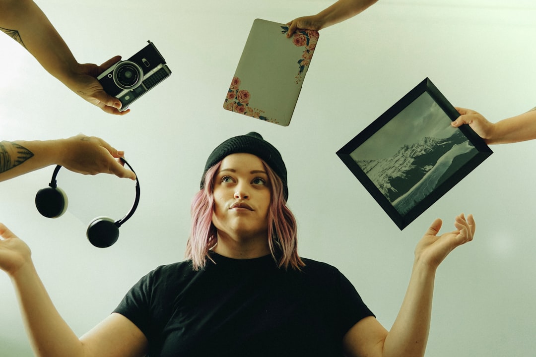 woman in black crew neck t-shirt holding camera, Quarantined.
