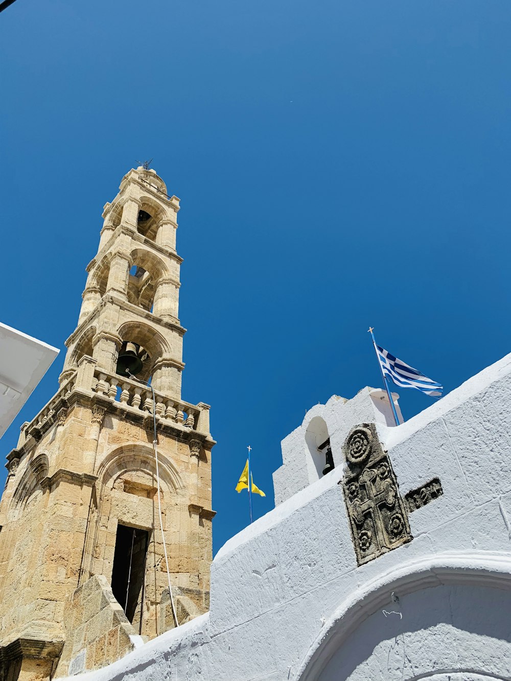 white concrete building with flag of us a during daytime