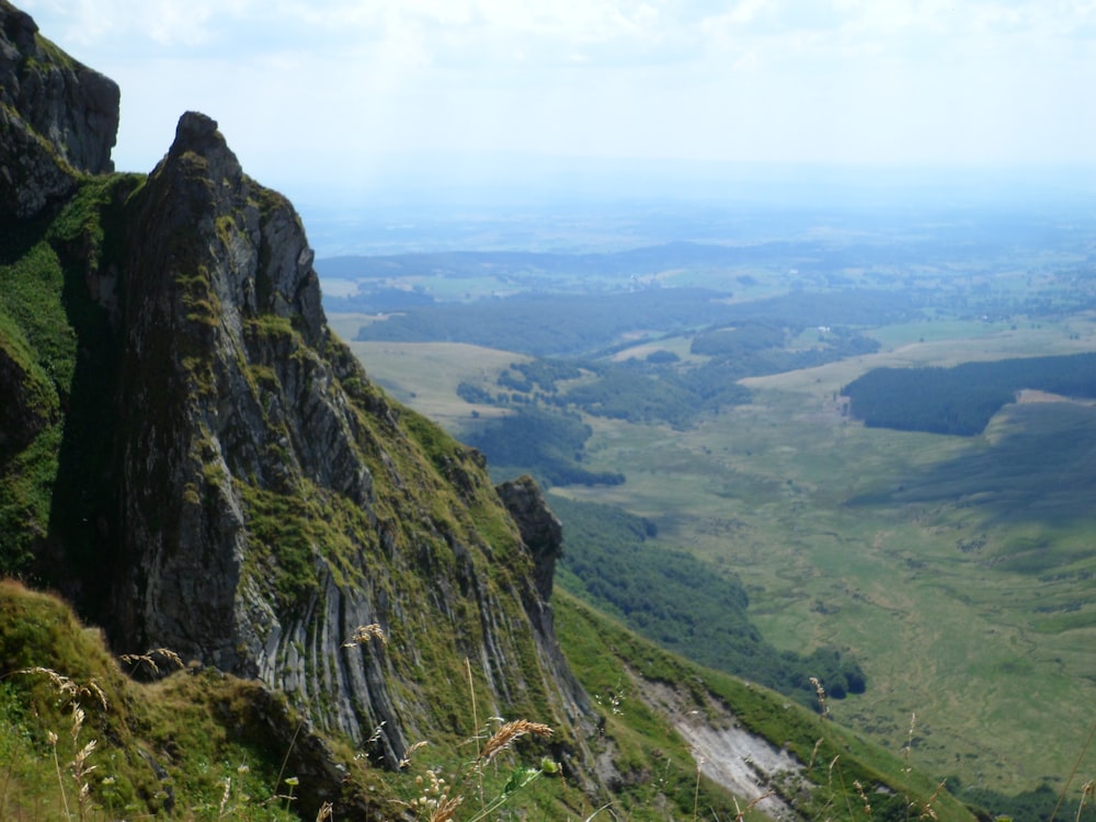 green and brown mountain under blue sky during daytime