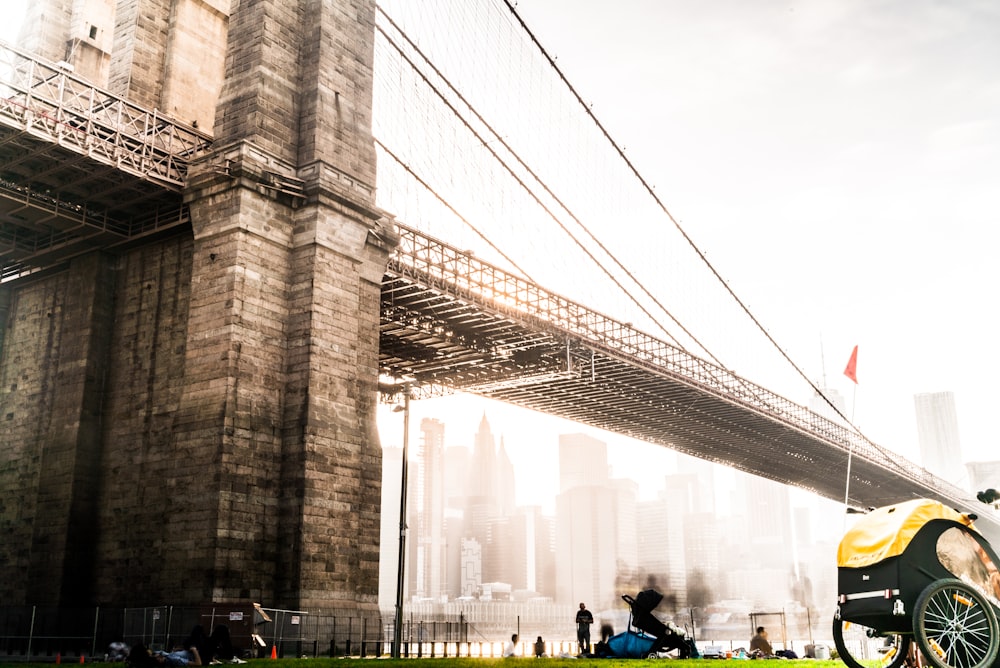 people walking on bridge during daytime