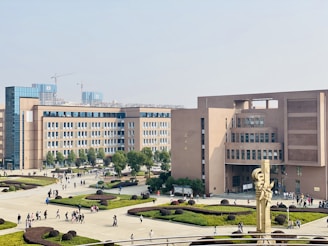 people walking on park near building during daytime