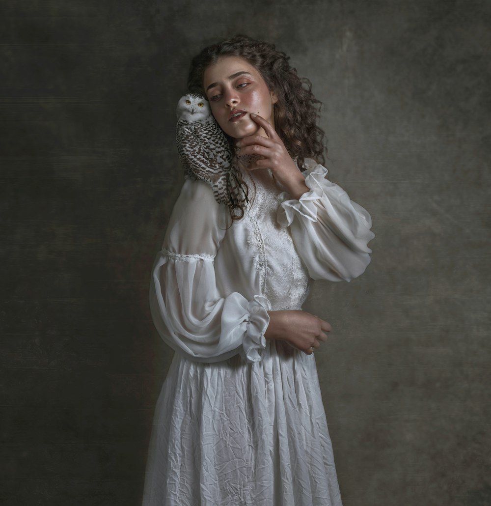 woman in white long sleeve dress