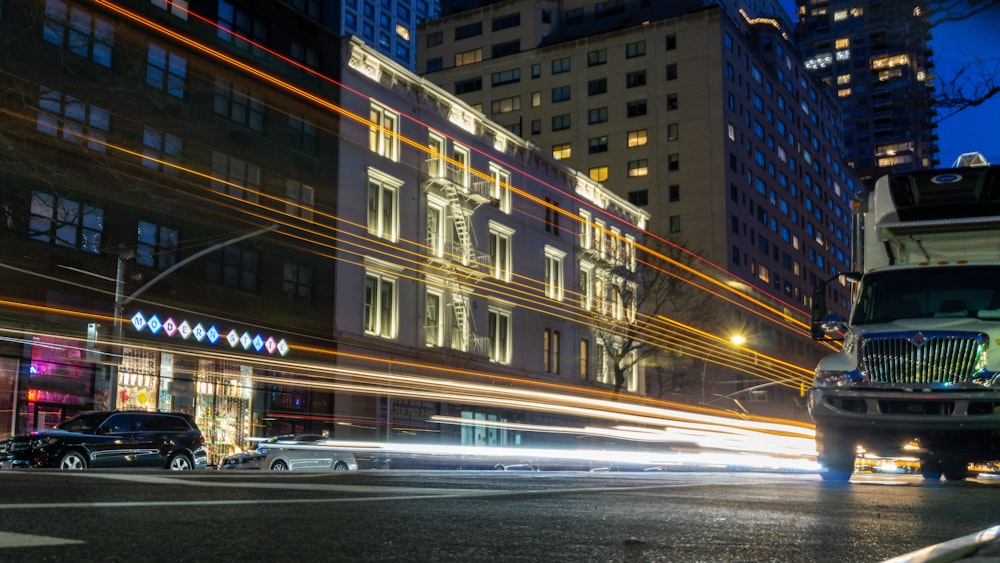 time lapse photography of cars on road during night time