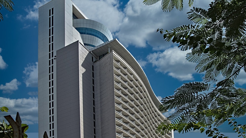 white concrete building under blue sky during daytime