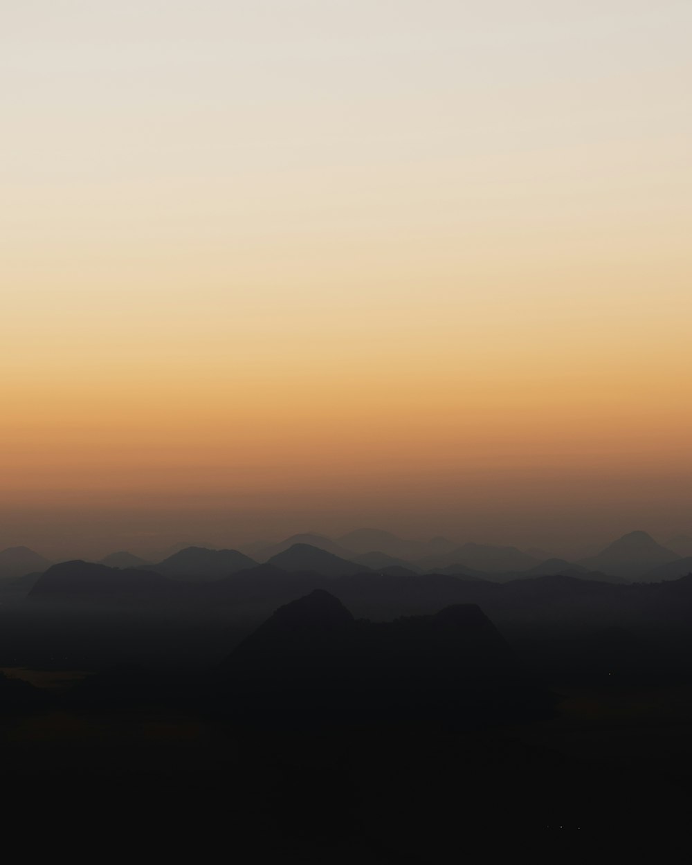 silhouette of mountains during daytime