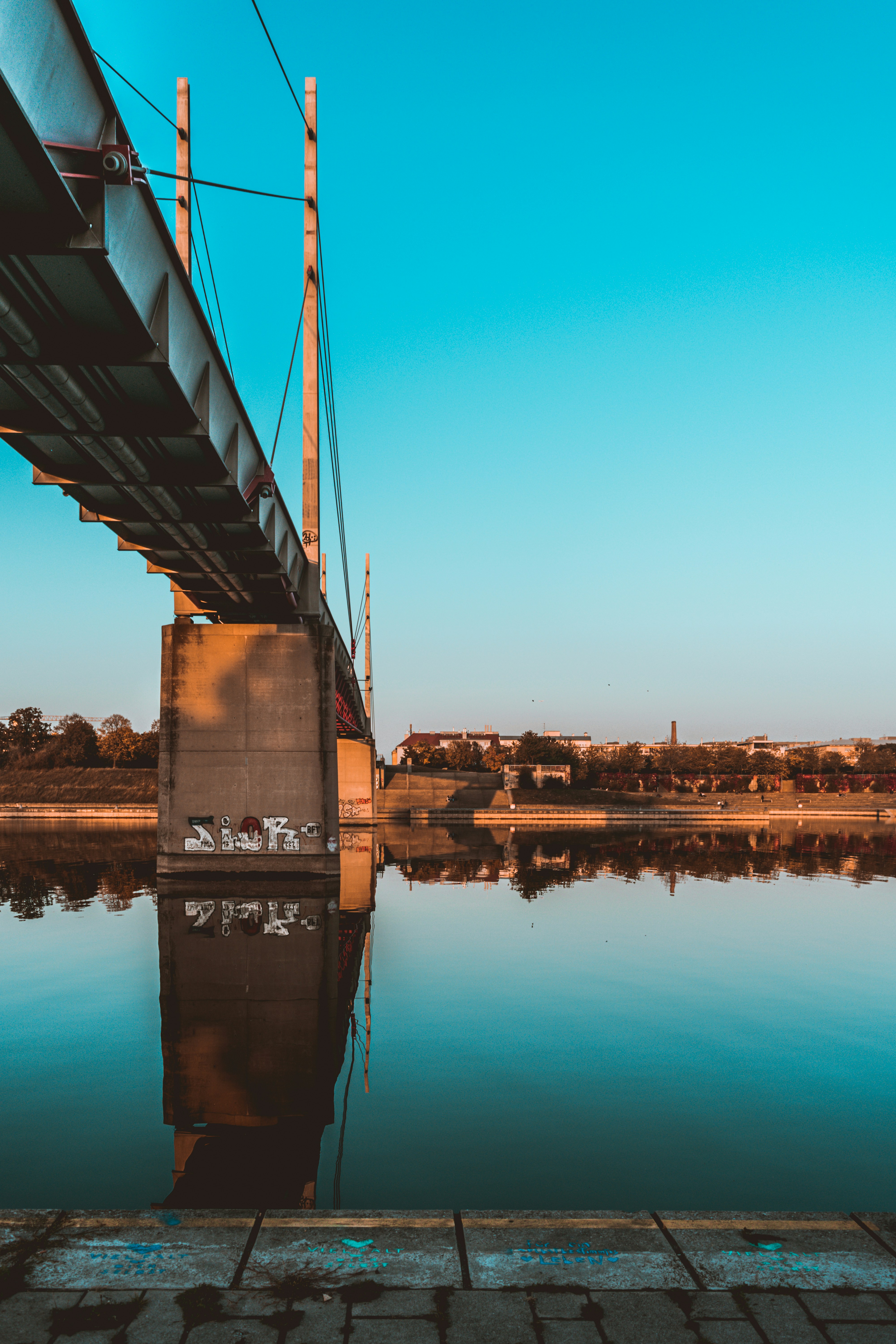 bridge over water during night time