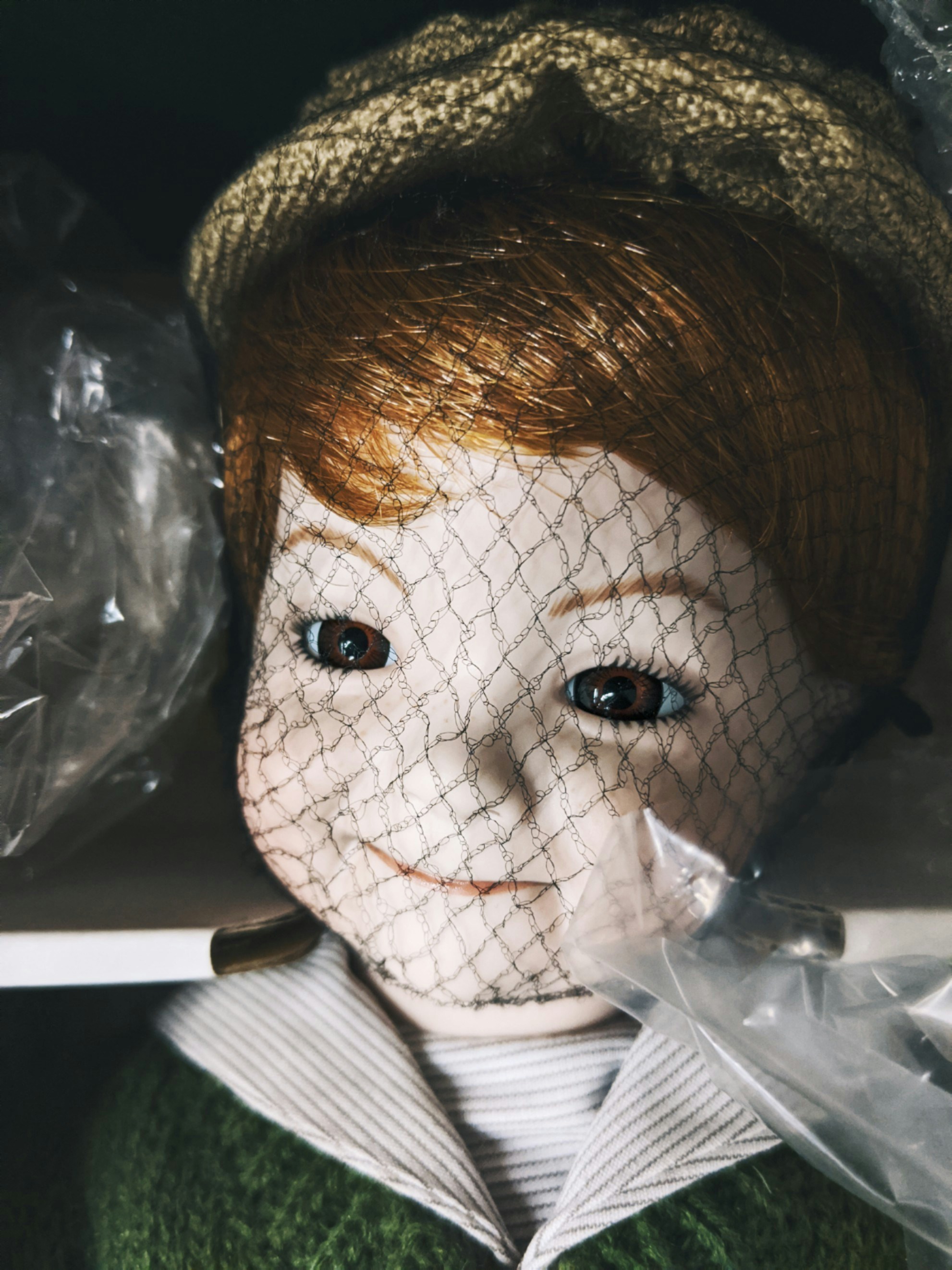 Disturbing living doll with exaggerated features