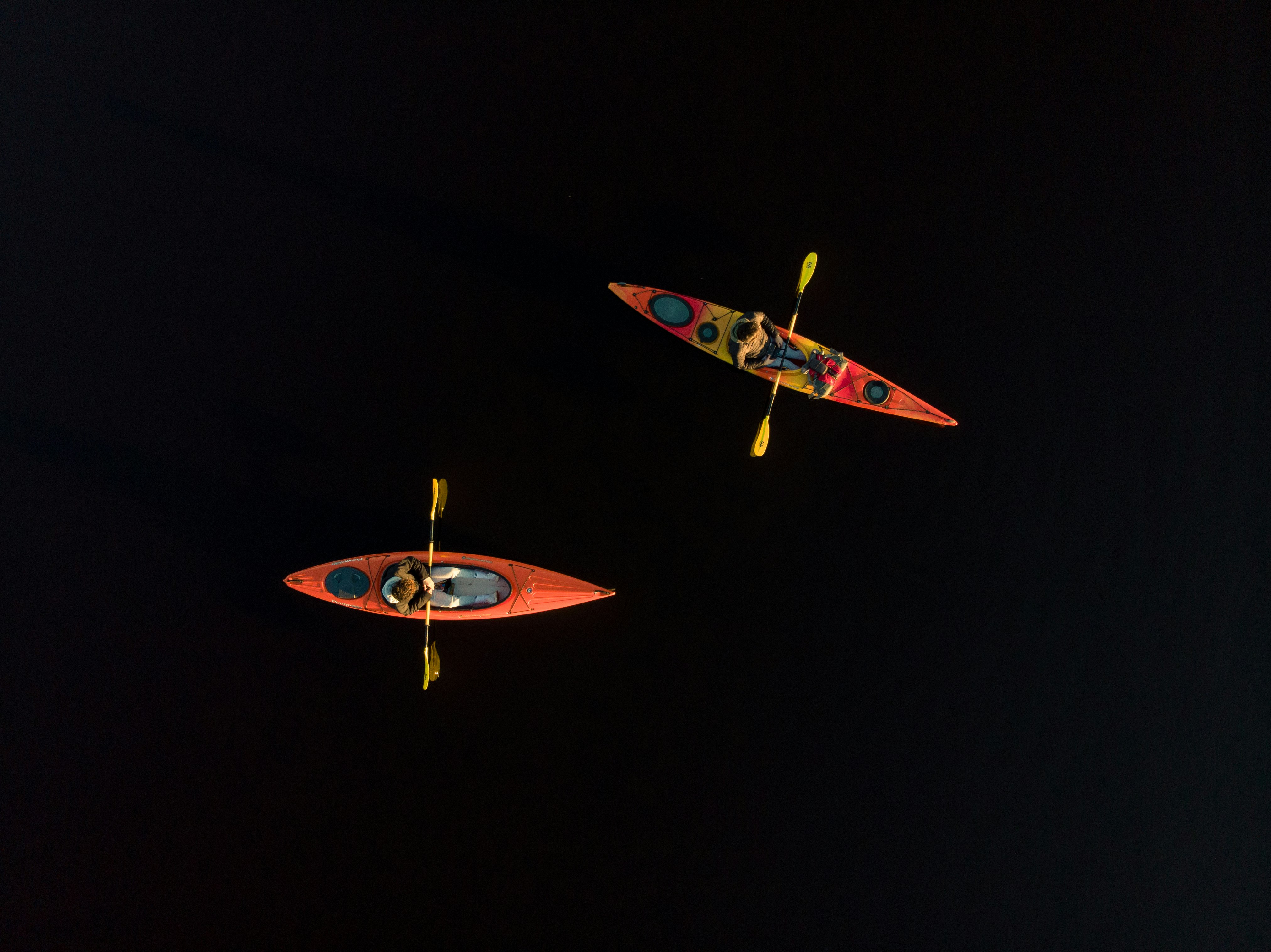 blue and yellow plane with red and yellow lights