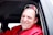 man in red dress shirt wearing black sunglasses