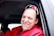 man in red dress shirt wearing black sunglasses