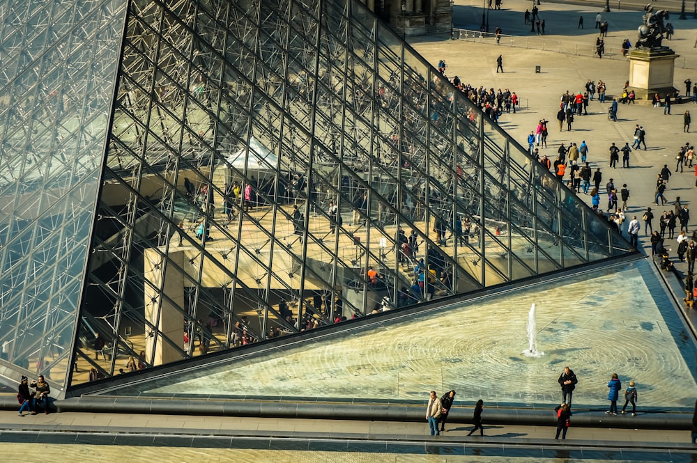 people walking on gray concrete floor