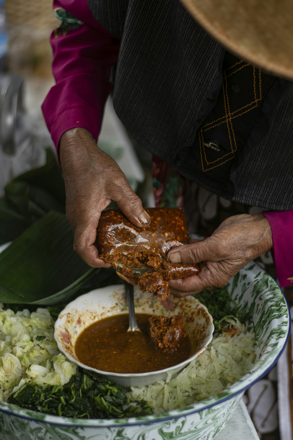 person holding stainless steel fork