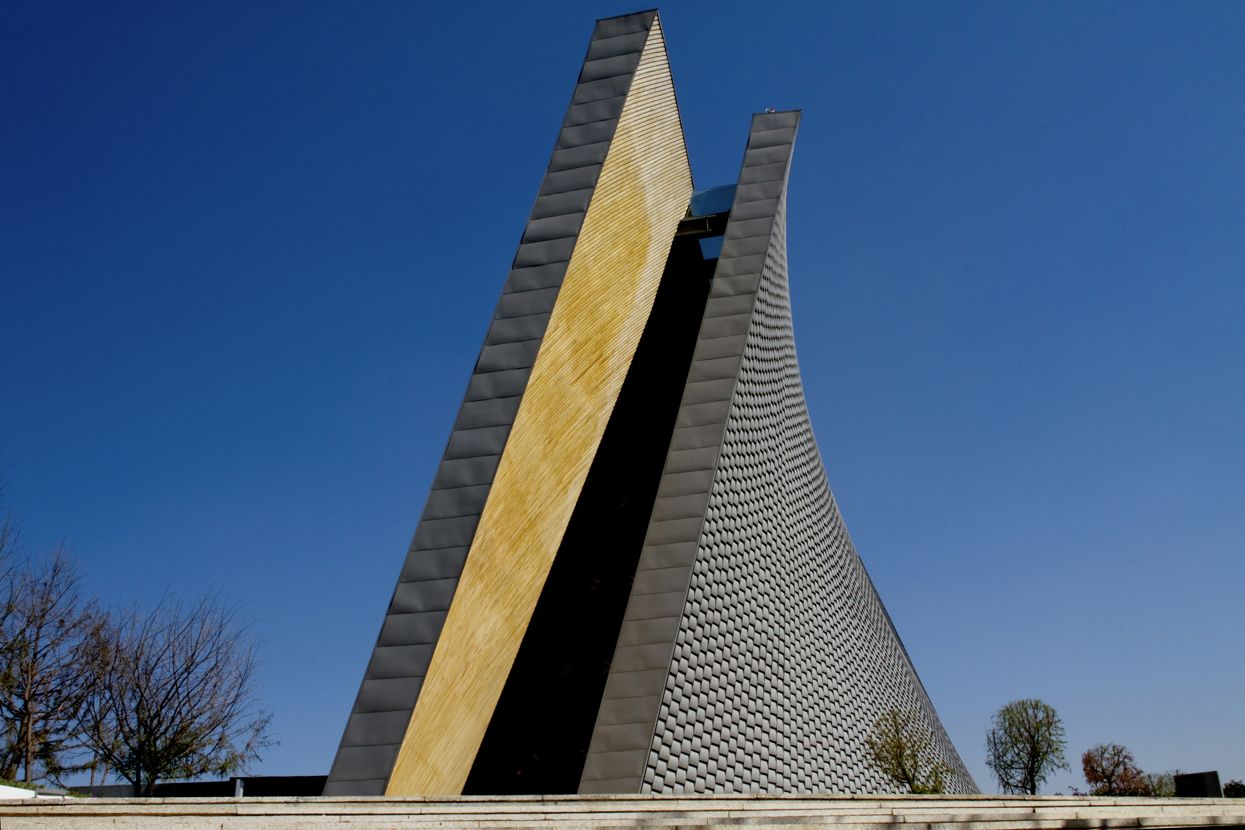 gray concrete building under blue sky during daytime