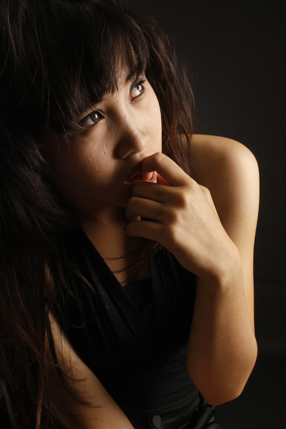 woman in black tank top