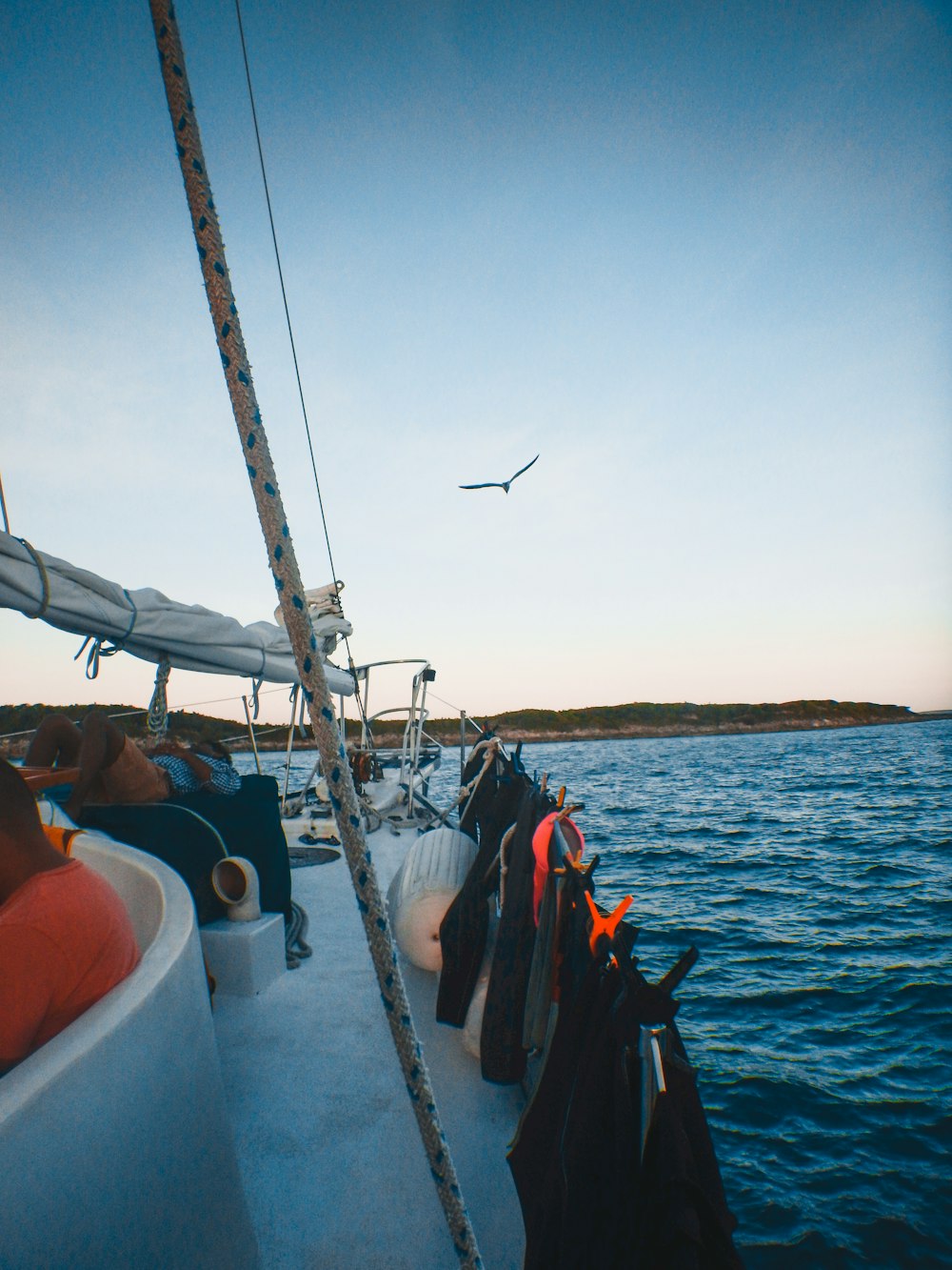 people riding on boat during daytime