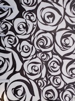black white and pink textile
