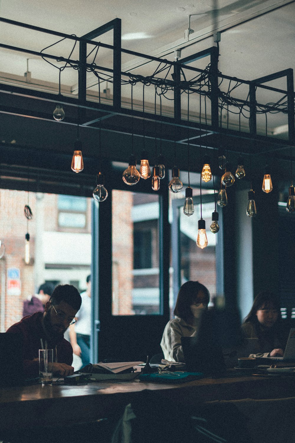 man and woman sitting on chair in restaurant