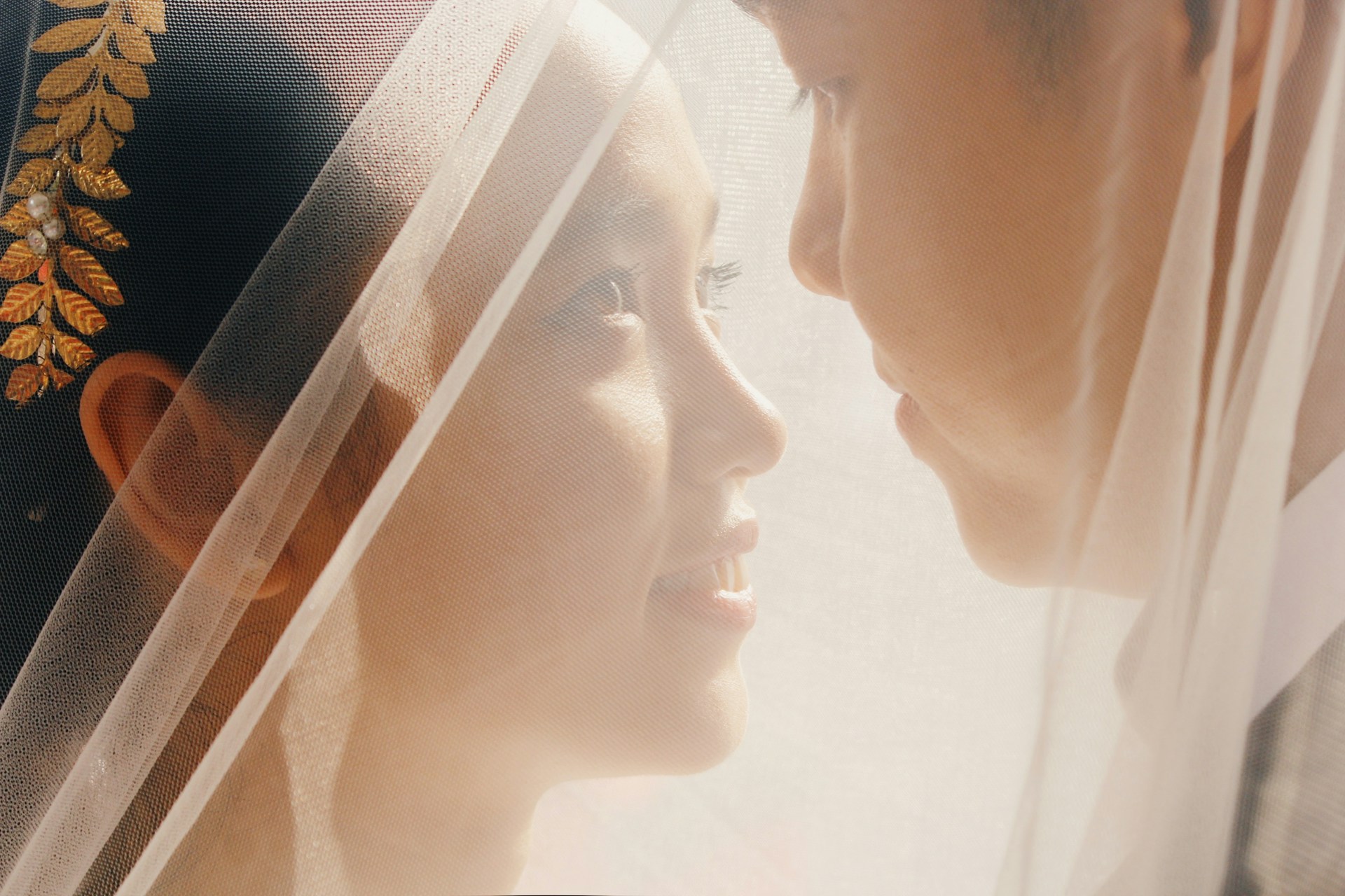 woman wearing yellow long-sleeved dress under white clouds and blue sky during daytime