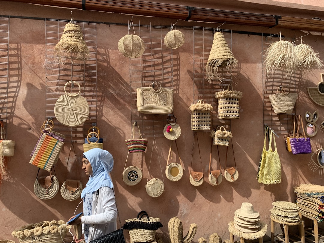 brown wooden hanging decor on brown wooden wall, Wall where handmade goods like baskets where presented for selling in M