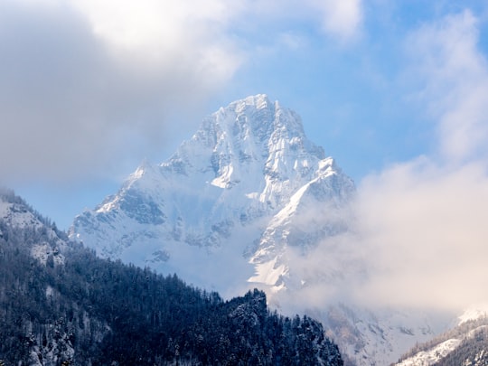 snow covered mountain under cloudy sky during daytime in Hinterstoder Austria