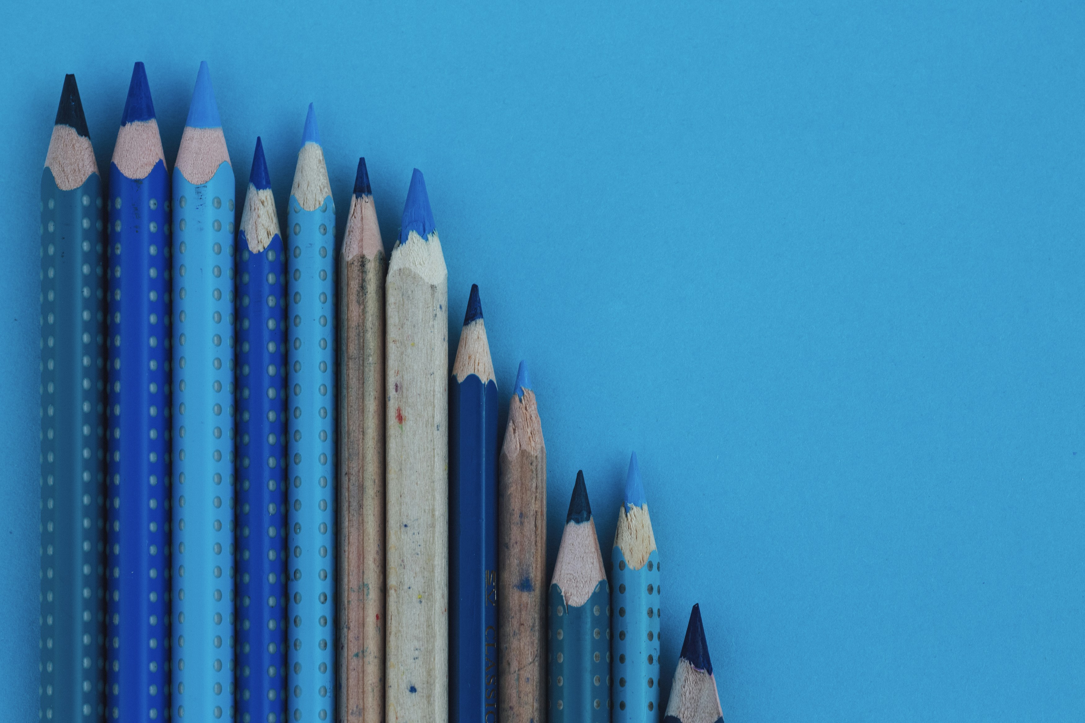 blue and brown wooden pencil