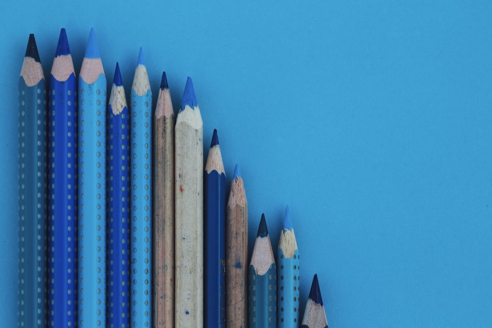 blue and brown wooden pencil