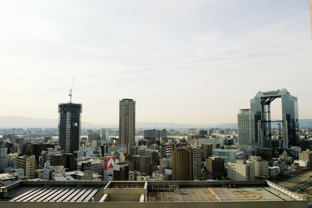 city skyline under white sky during daytime