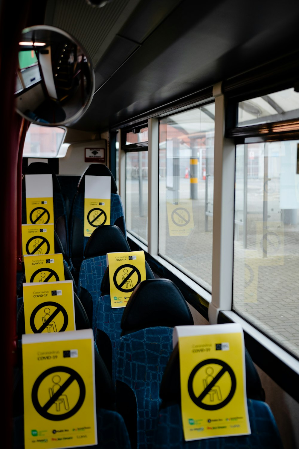 blue and yellow bus seats