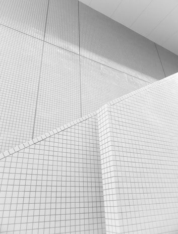 Geometric shapes and patterns drawn with precision on graph paper.