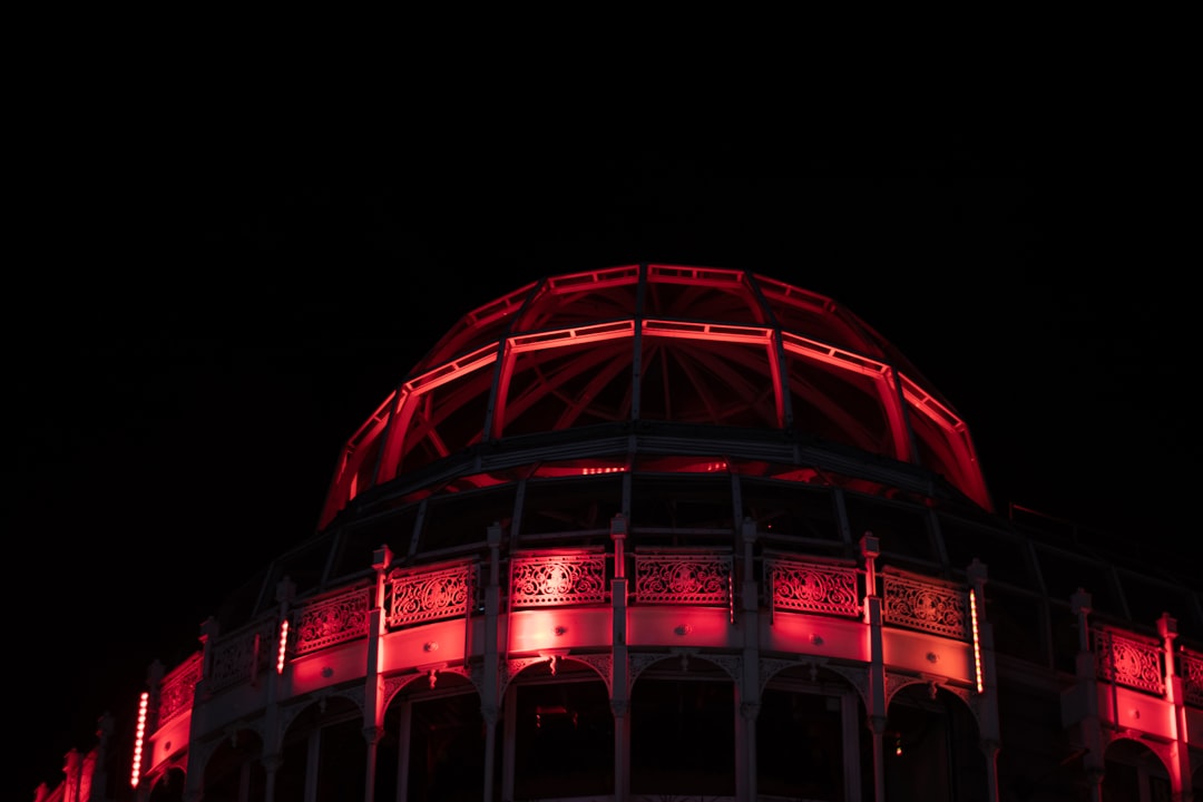 red metal dome building during nighttime