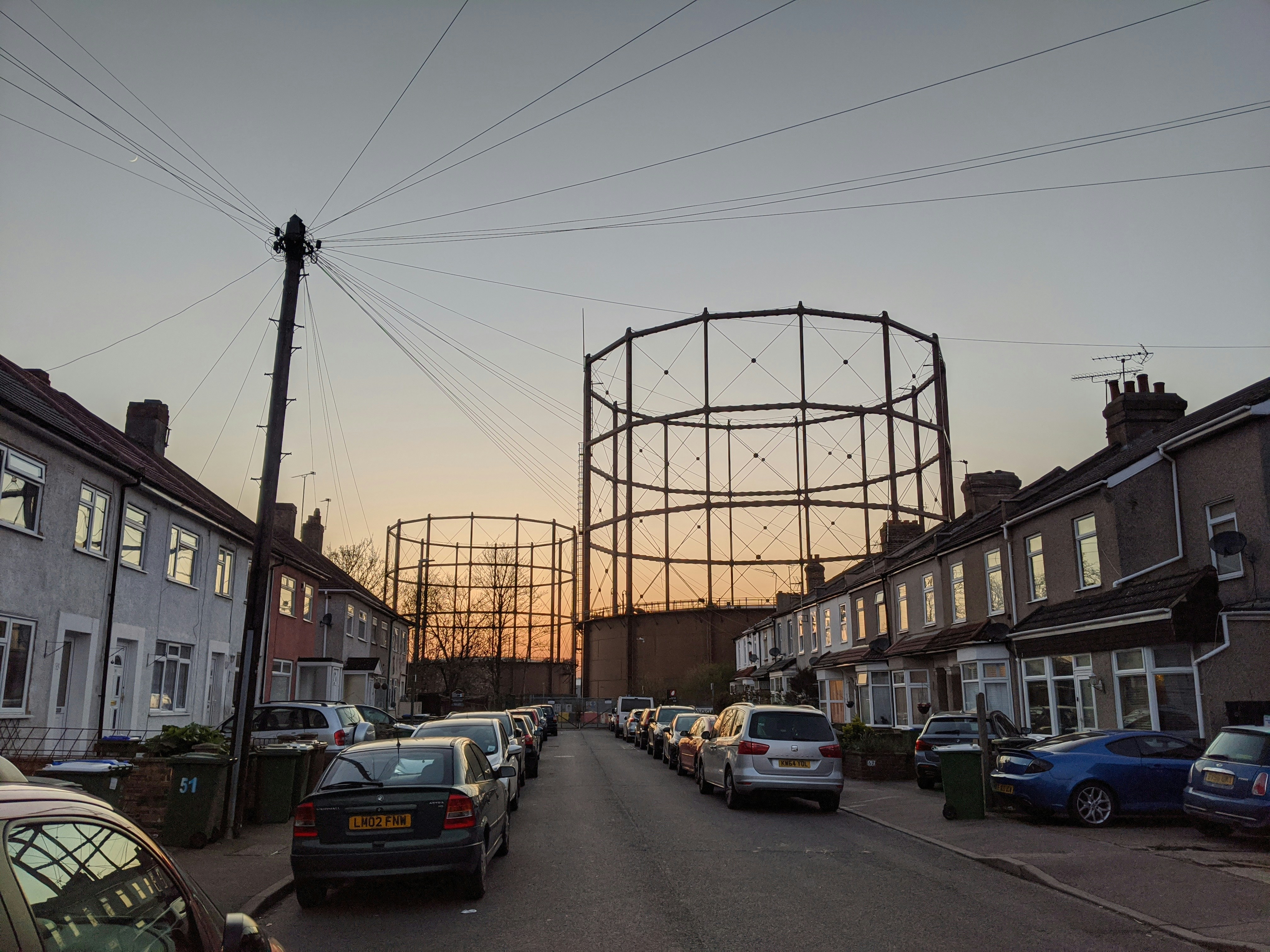 cars parked on side of the road during daytime