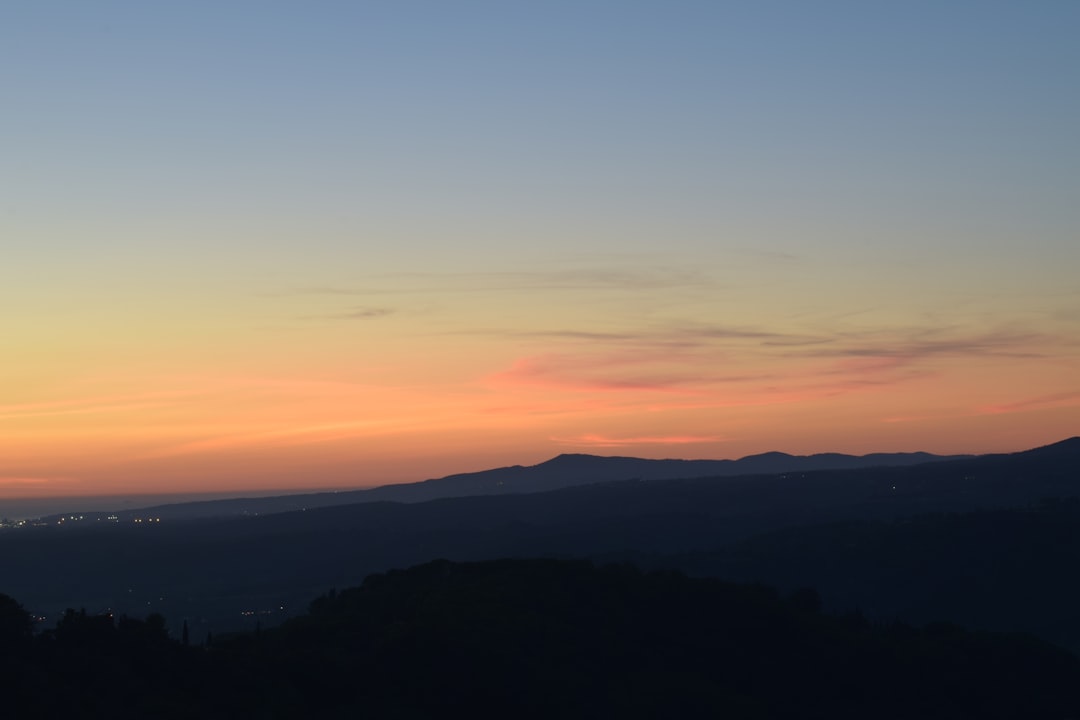 silhouette of mountains during sunset