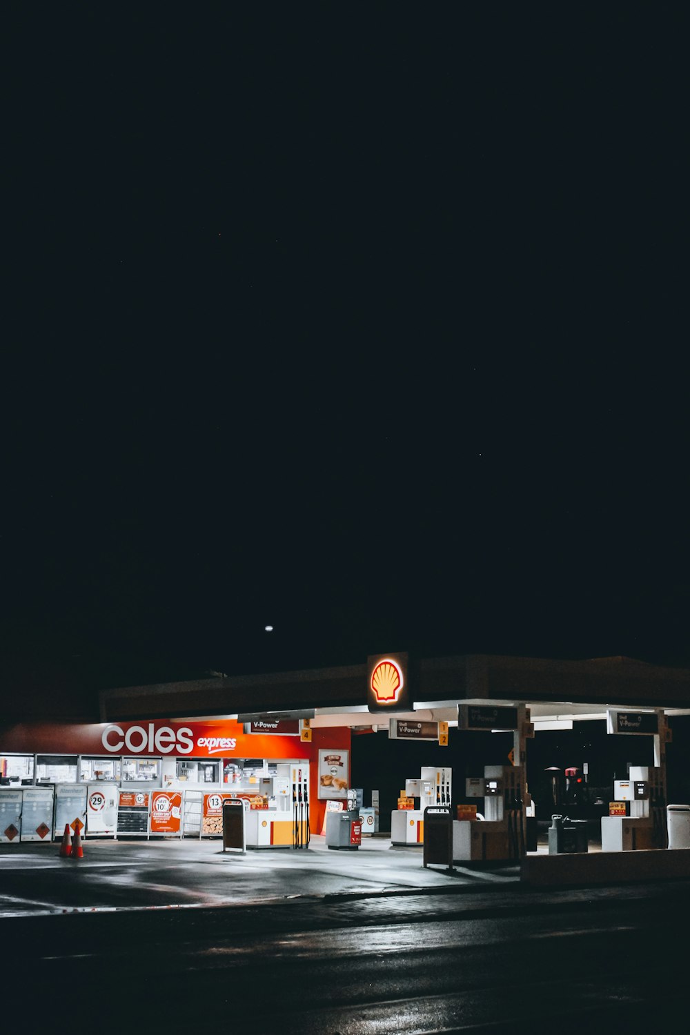 white and red store during night time