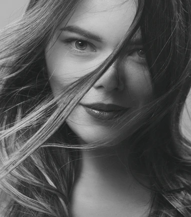 A close-up portrait of Blanca Reygal with a warm, confident expression.