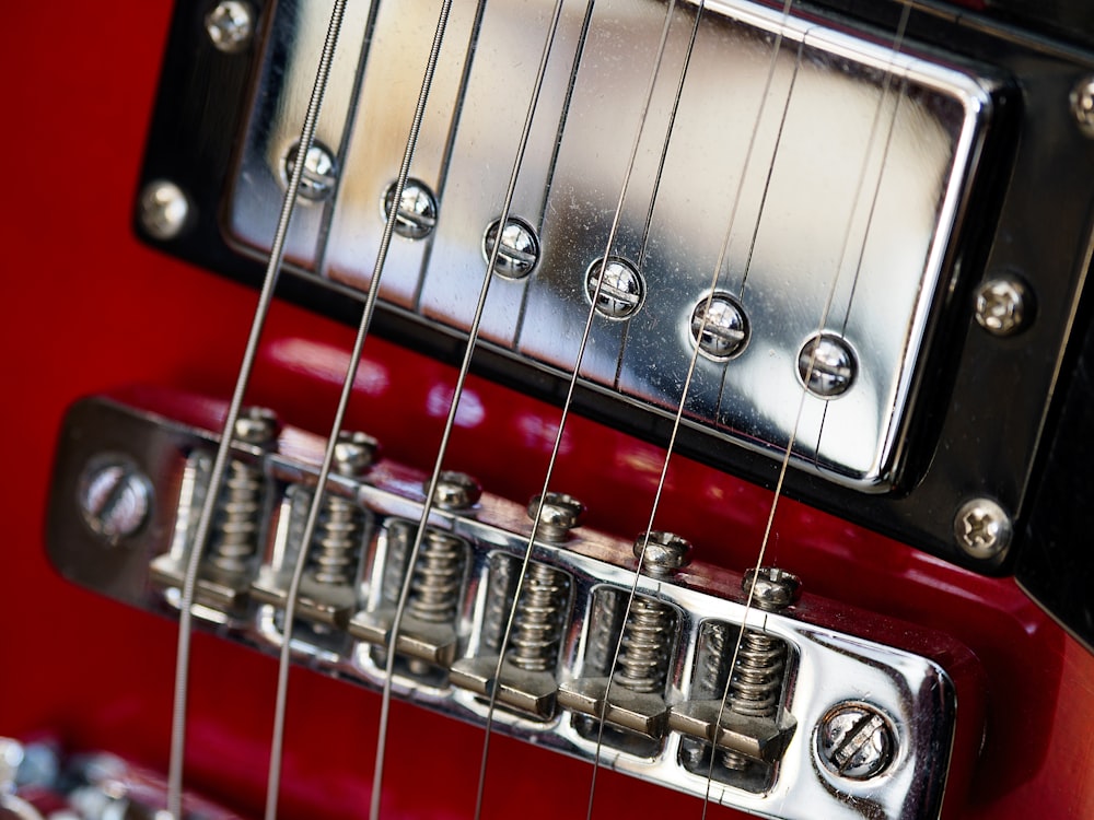 red and white electric guitar