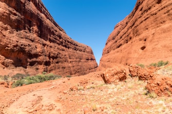 brown rock formation under blue sky during daytime