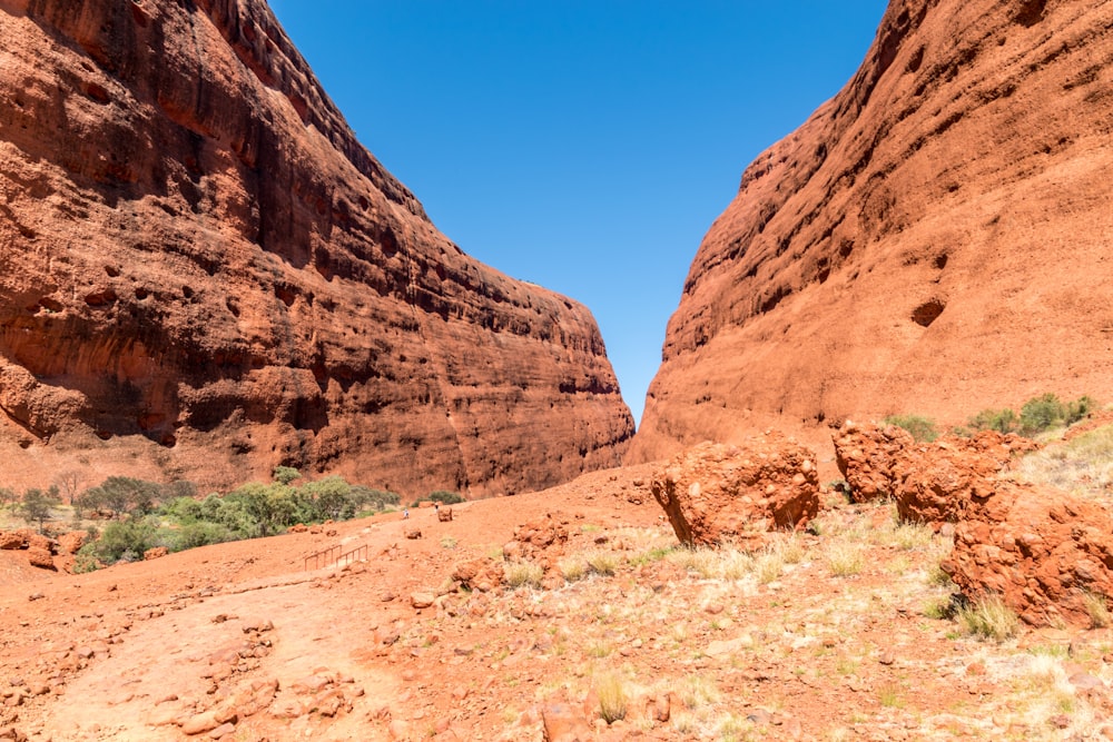 brown rock formation under blue sky during daytime