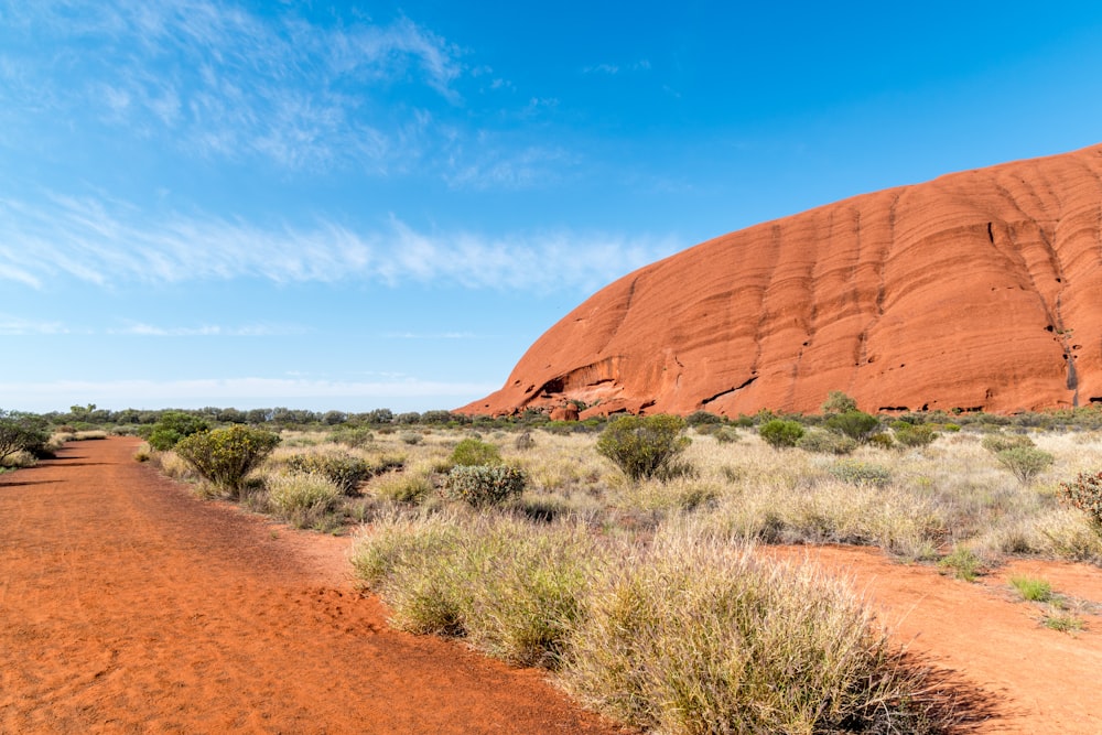 brown rock formation under blue sky during daytime