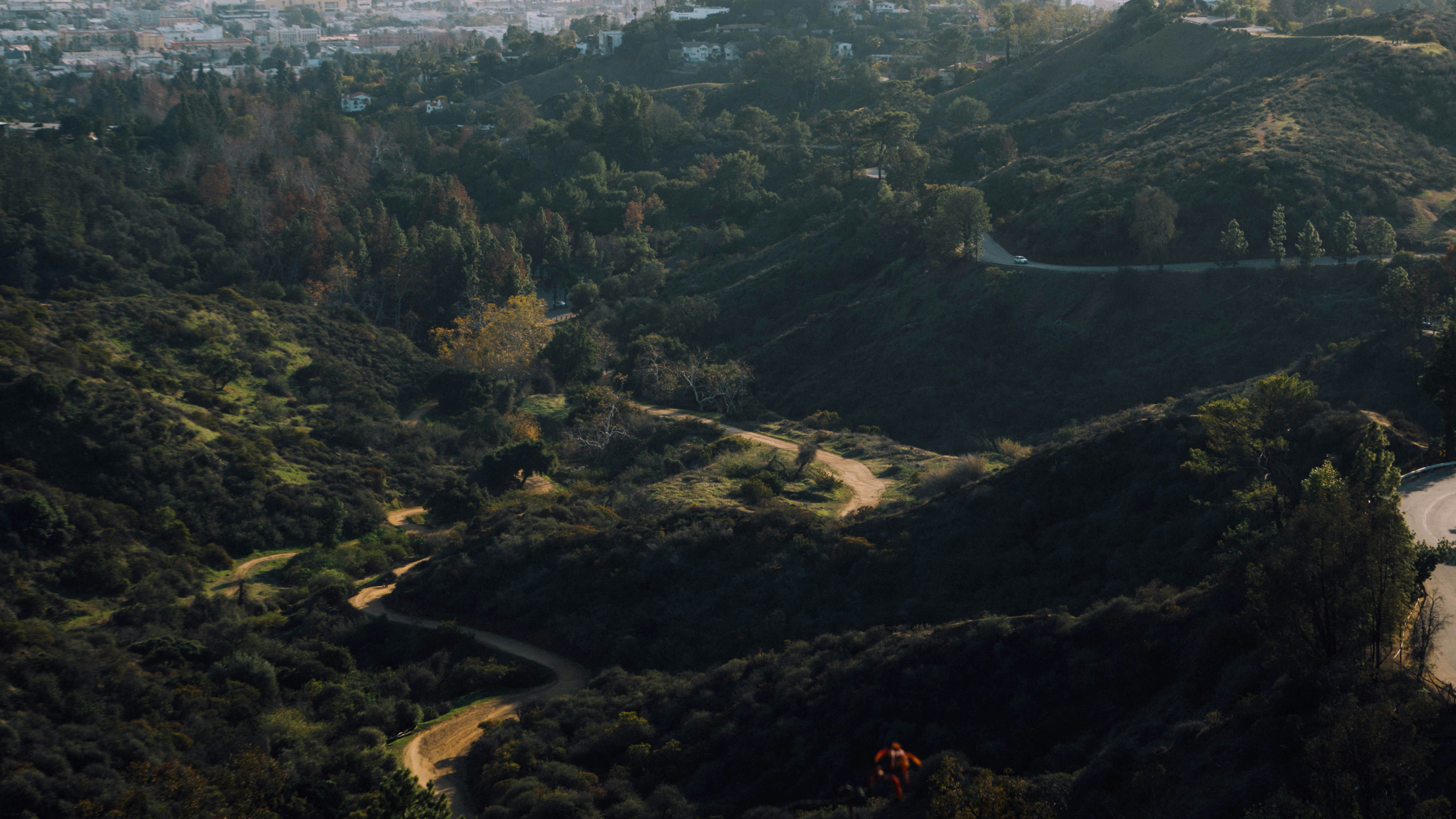 aerial view of green trees and mountains during daytime, Hiking trail near the Hollywood sign.