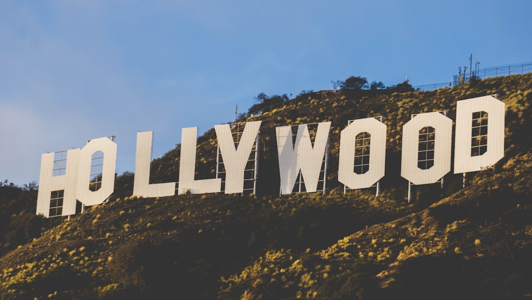 white wooden fence on green grass field, Hollywood.