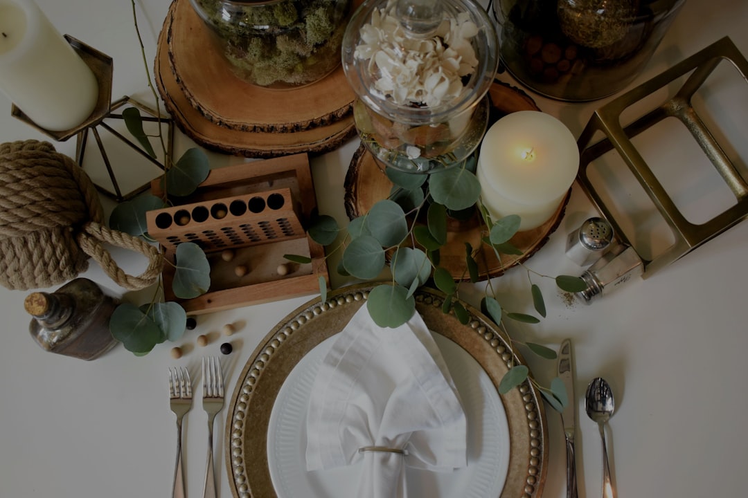 white ceramic bowl on white and brown table cloth