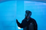 Technologist inspecting insulation layers inside a cold storage facility.