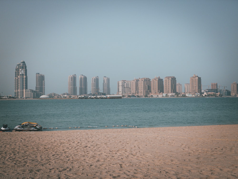 high rise buildings near sea during daytime