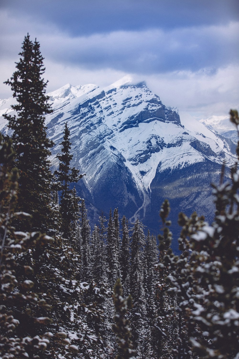 snow covered mountain during daytime