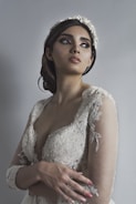A beautifully styled bride showcasing elegant makeup and hairstyle.