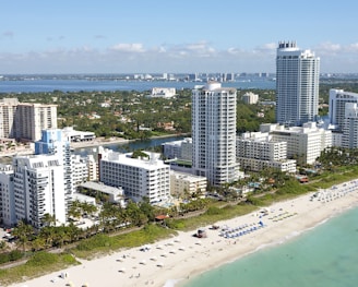 city buildings near sea during daytime