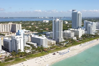 city buildings near sea during daytime