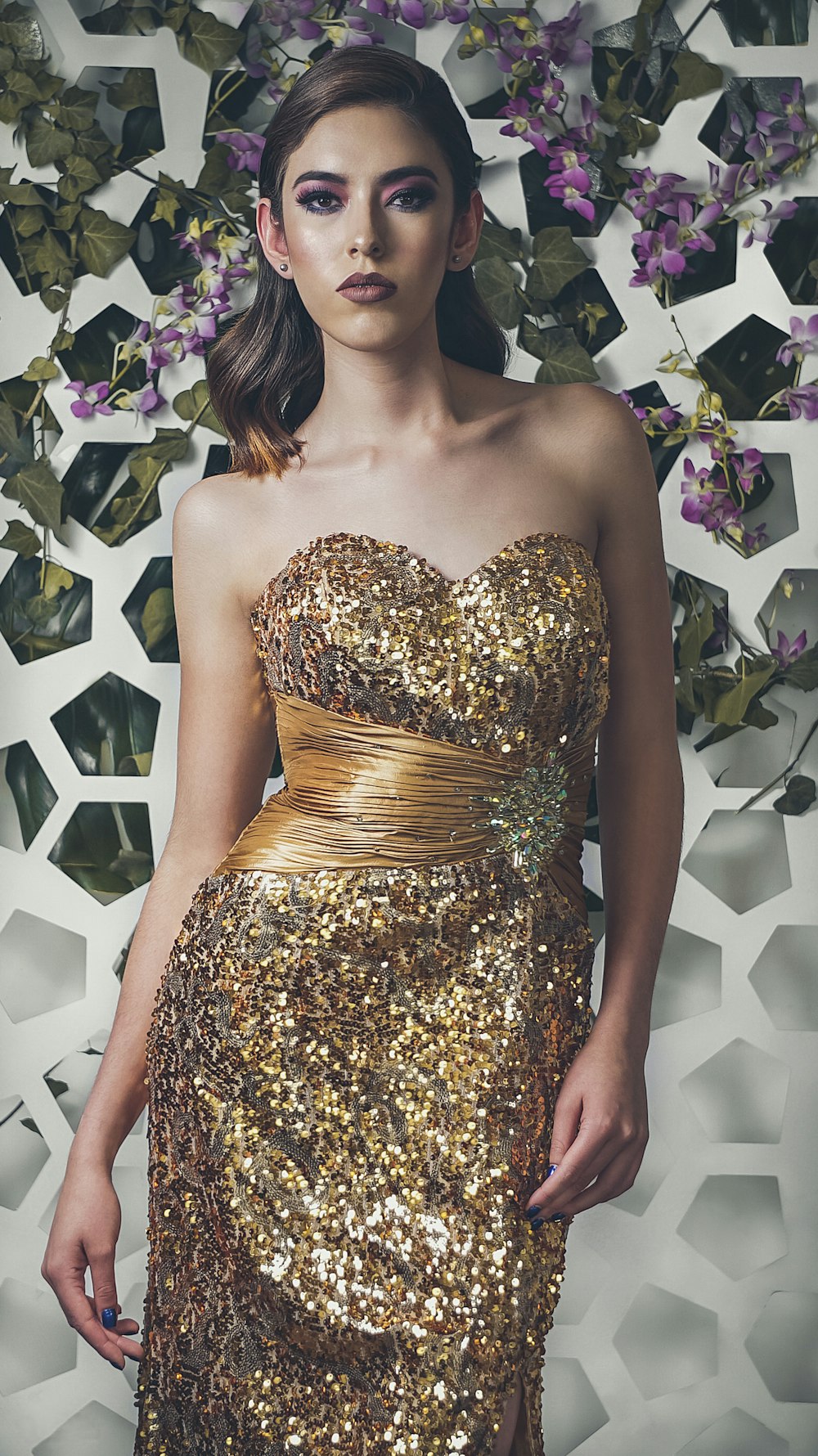 woman in yellow and black floral tube dress